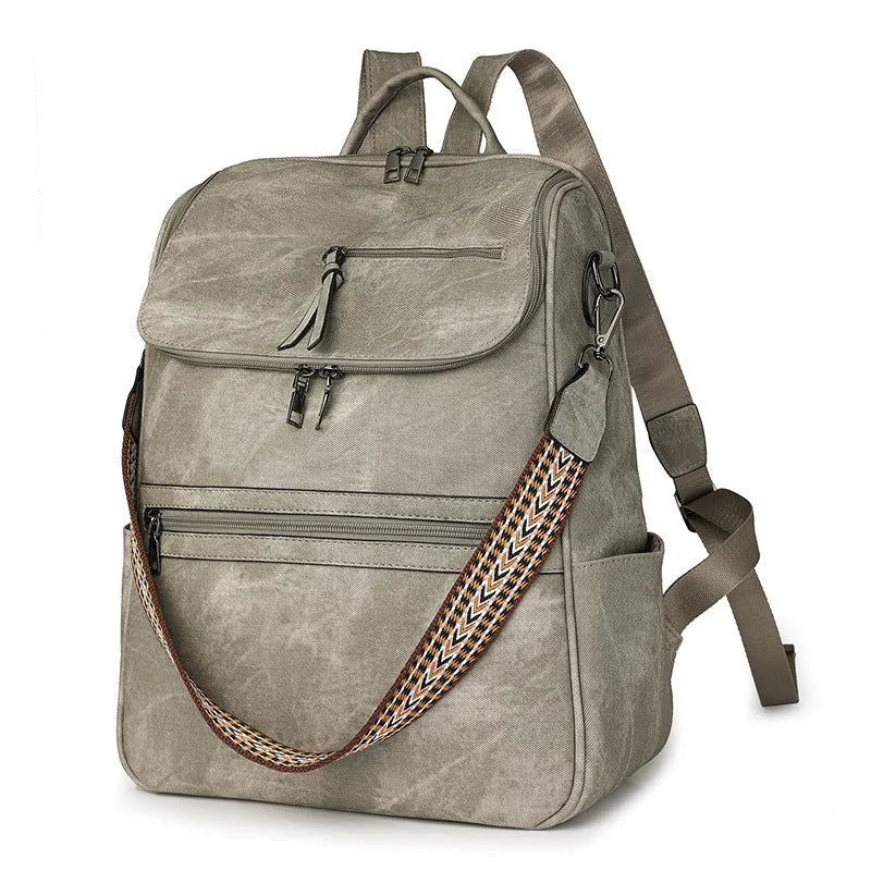 Retro college student backpack in black with curved shoulder straps and stitching detail