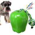 Green plastic dog food dropping ball with textured molar cleaning surfaces