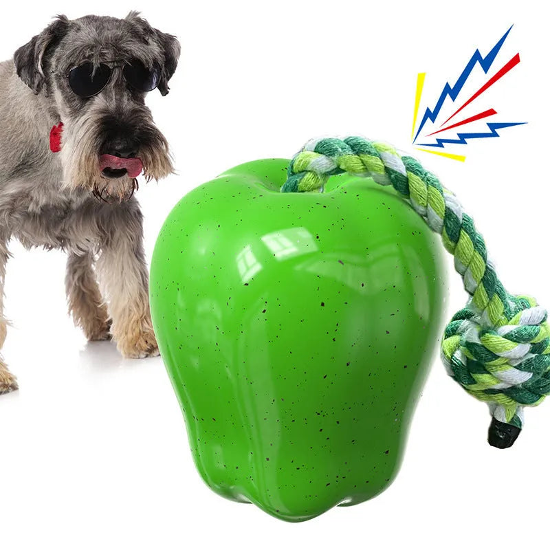 Green plastic dog food dropping ball with textured molar cleaning surfaces