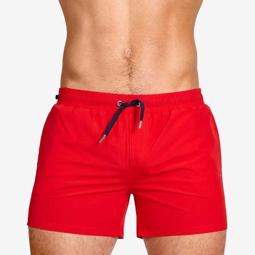Man's mesh lining sports shorts in army green colour for swimming and fitness