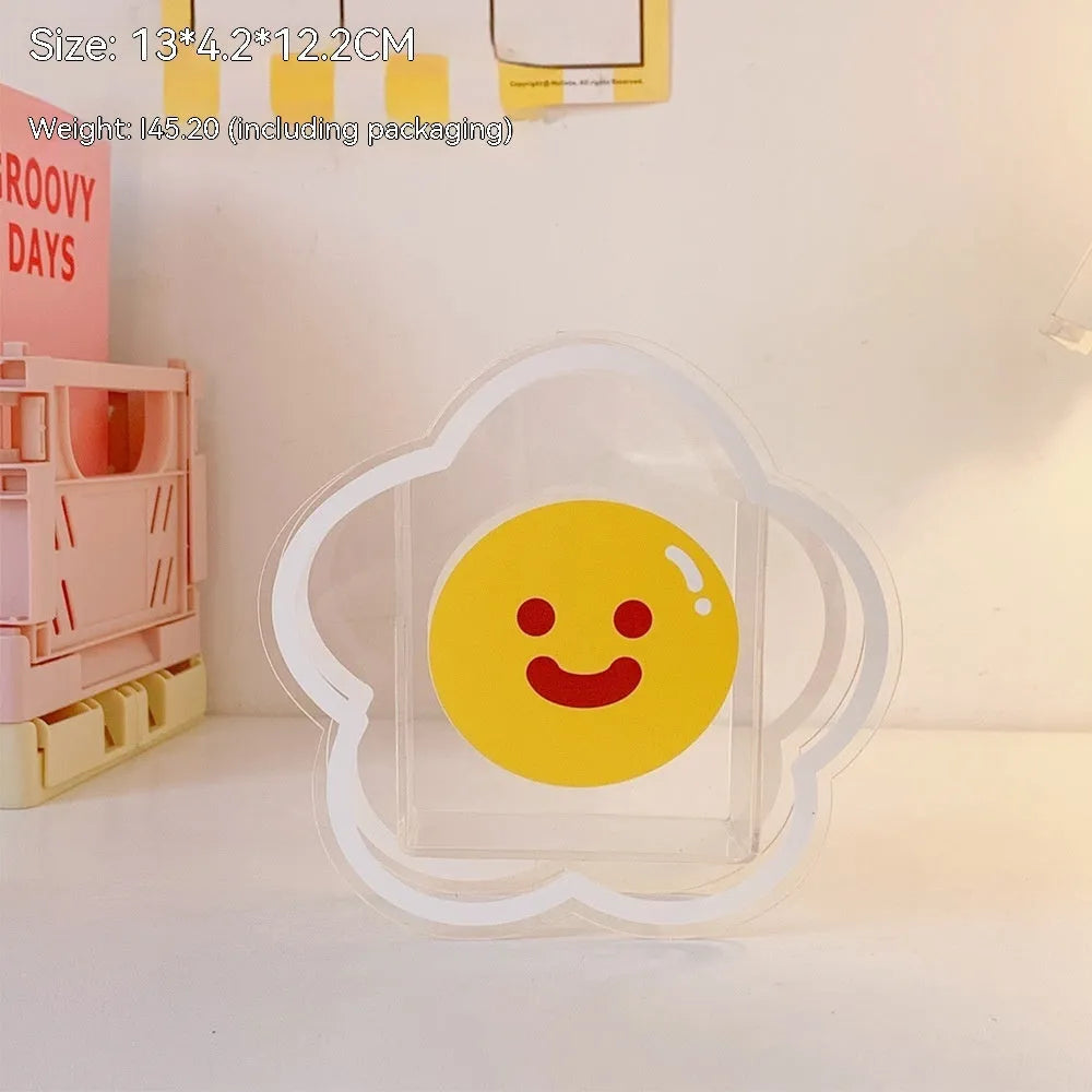 Clear square acrylic stationery storage box with lid in cute character design on desktop