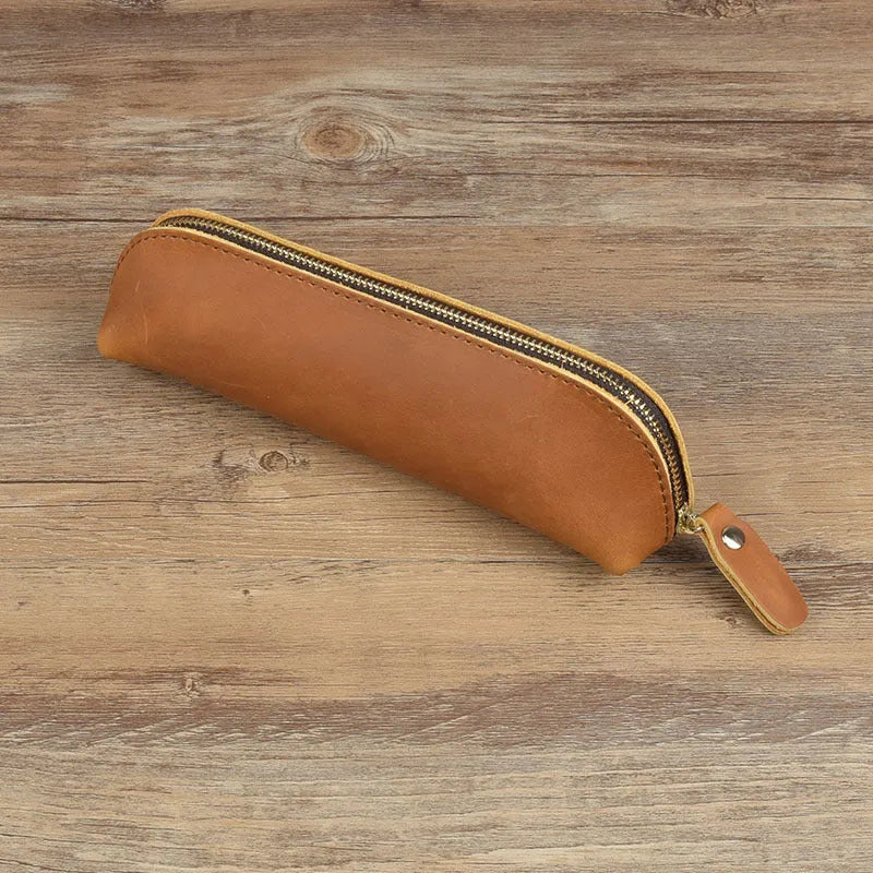 Black handmade cowhide leather pencil case with zipper, showing square 18cm design.