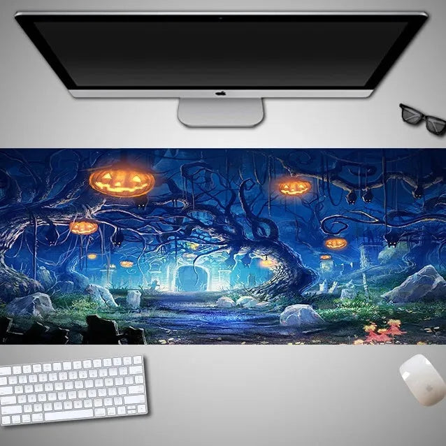 Oversized Halloween-themed gaming mouse pad with non-slip base on a desk.