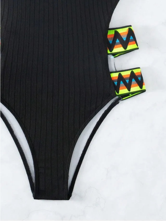 Women's black or orange solid colour one-piece swimming suit bikini