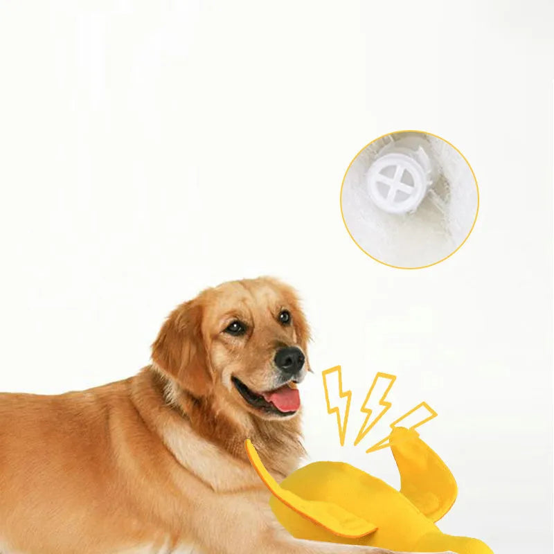 Yellow teddy bear shaped dog toy with food leak compartment and squeaker for training and enrichment