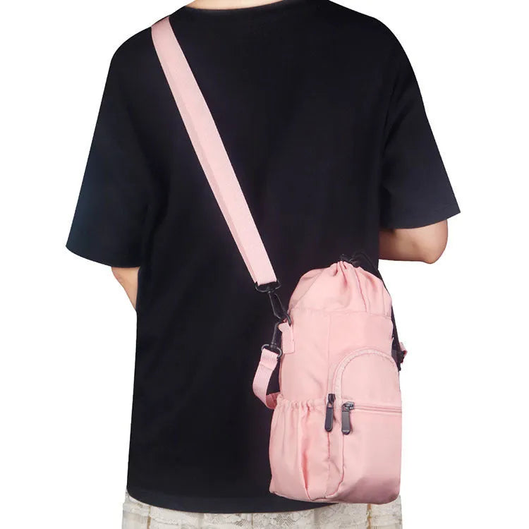 Cloth water bottle pouch with crossbody shoulder strap in black, green or pink colour