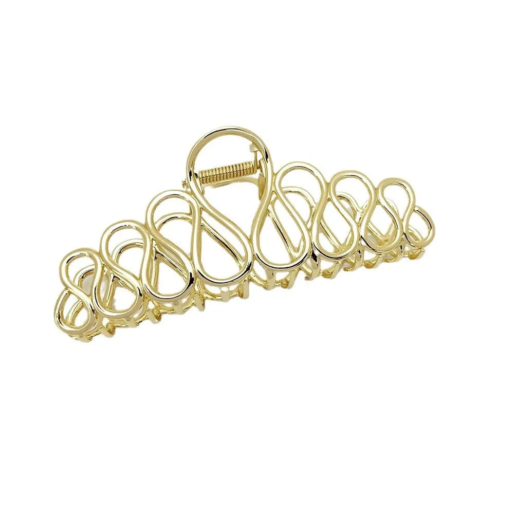 Gold and silver alloy hair clip with tassel detail for updo hairstyles
