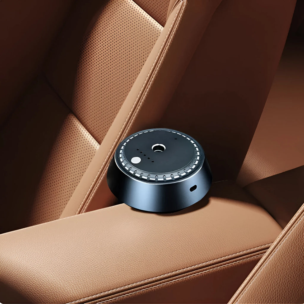 Black car aroma diffuser with USB charging and timing controls for vehicle use