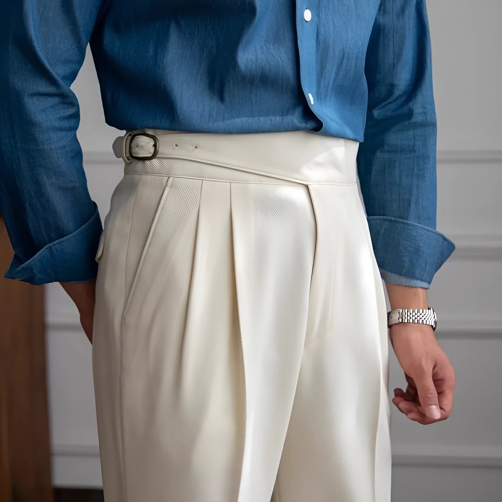 Man wearing high waist straight leg casual trousers in black polyester fabric.