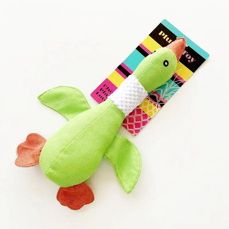 Blue green or grey durable plush duck dog toy with squeaker for chewing and play.