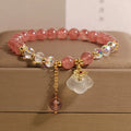 Women's adjustable strawberry quartz and white agate crystal bracelet with auspicious cloud beads