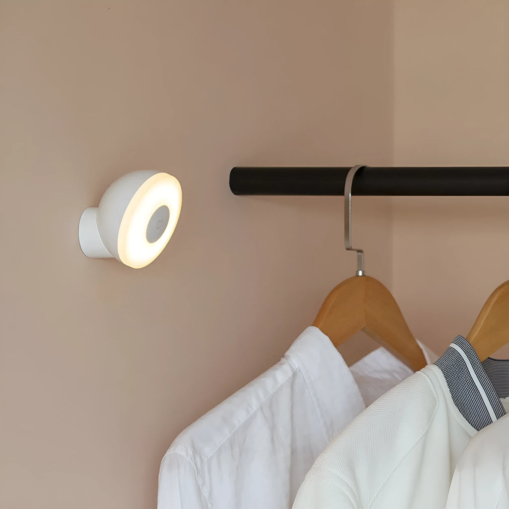 White modern bedside table lamp with Bluetooth and body induction sensor.