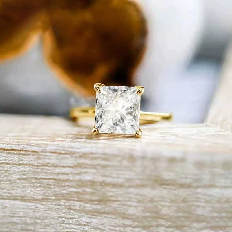 Simple geometric round 925 sterling silver women's ring in gold, rose gold, and silver colour options.