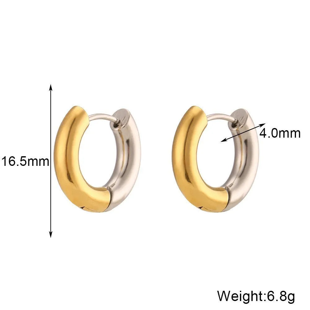 Gold electroplated geometric jewellery set with earrings, bracelet and necklace on white background
