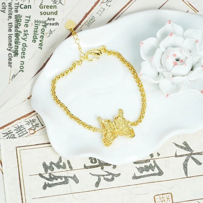 Gold-plated copper hollow butterfly bracelet with electroplated finish, retro style, gold colour