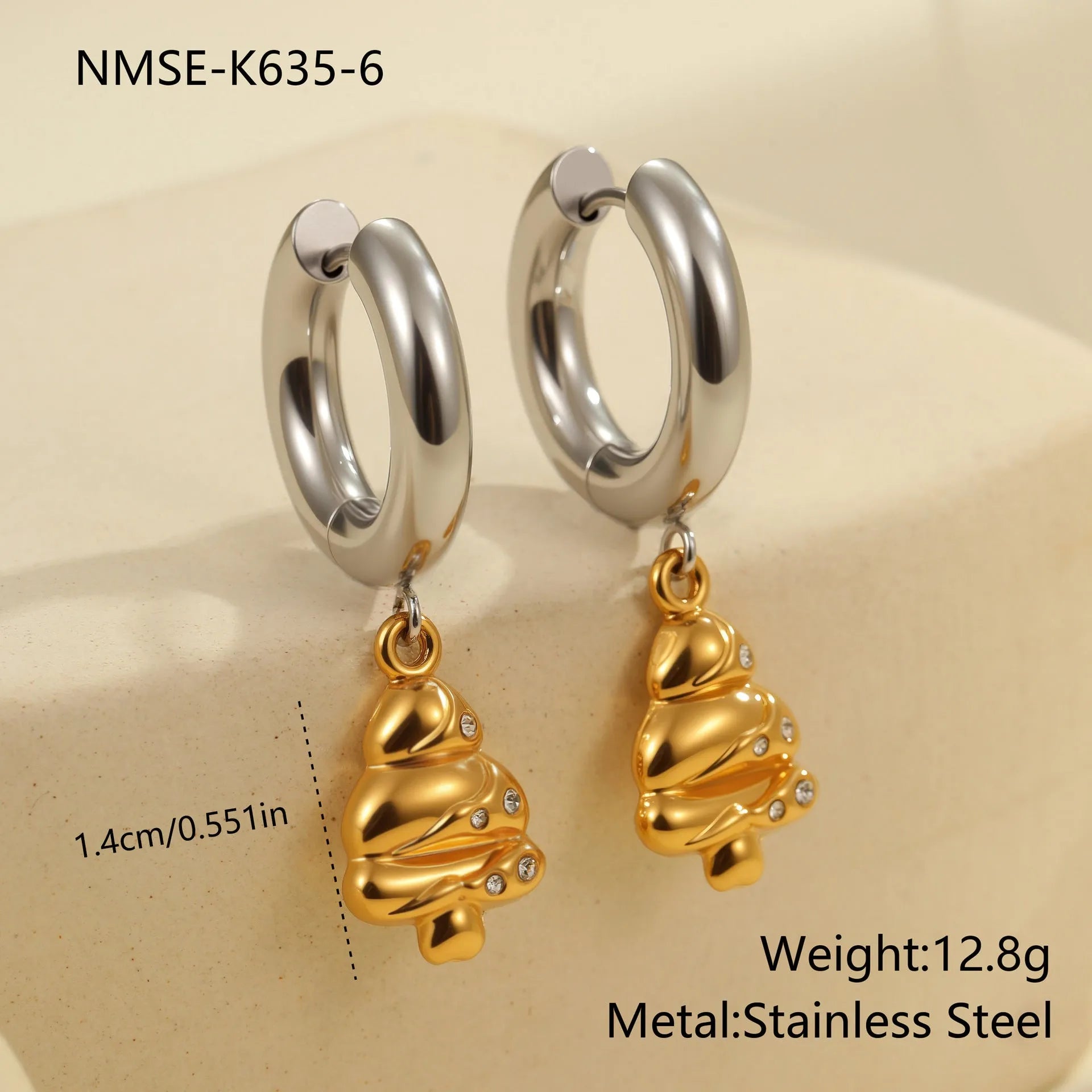 Christmas tree shaped stainless steel earrings with 18K gold electroplated finish and heart star geometric accents