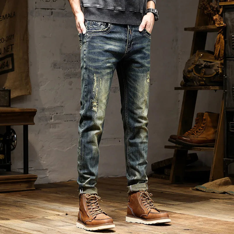 Men's retro blue stretch denim jeans with zip fly, shown in a slim-fit style