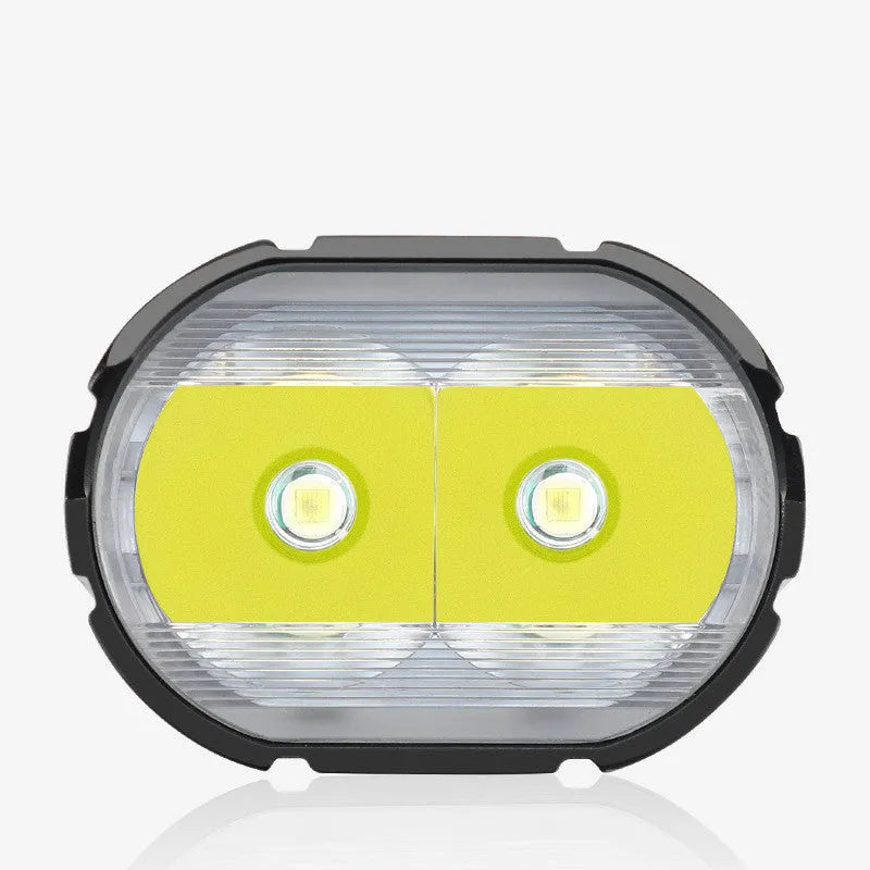 Black rechargeable bicycle light 1800 lumens with aluminium alloy body and POM bracket mounted on a handlebar