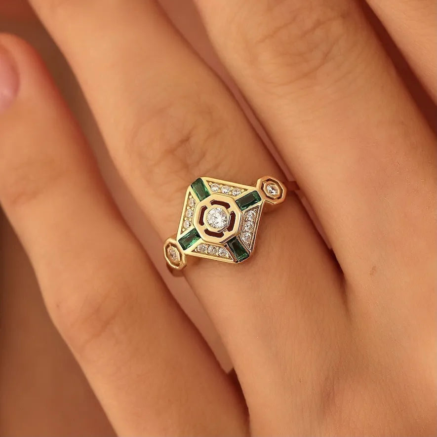 Square geometric women's ring in lvzuan green colour on a white background.