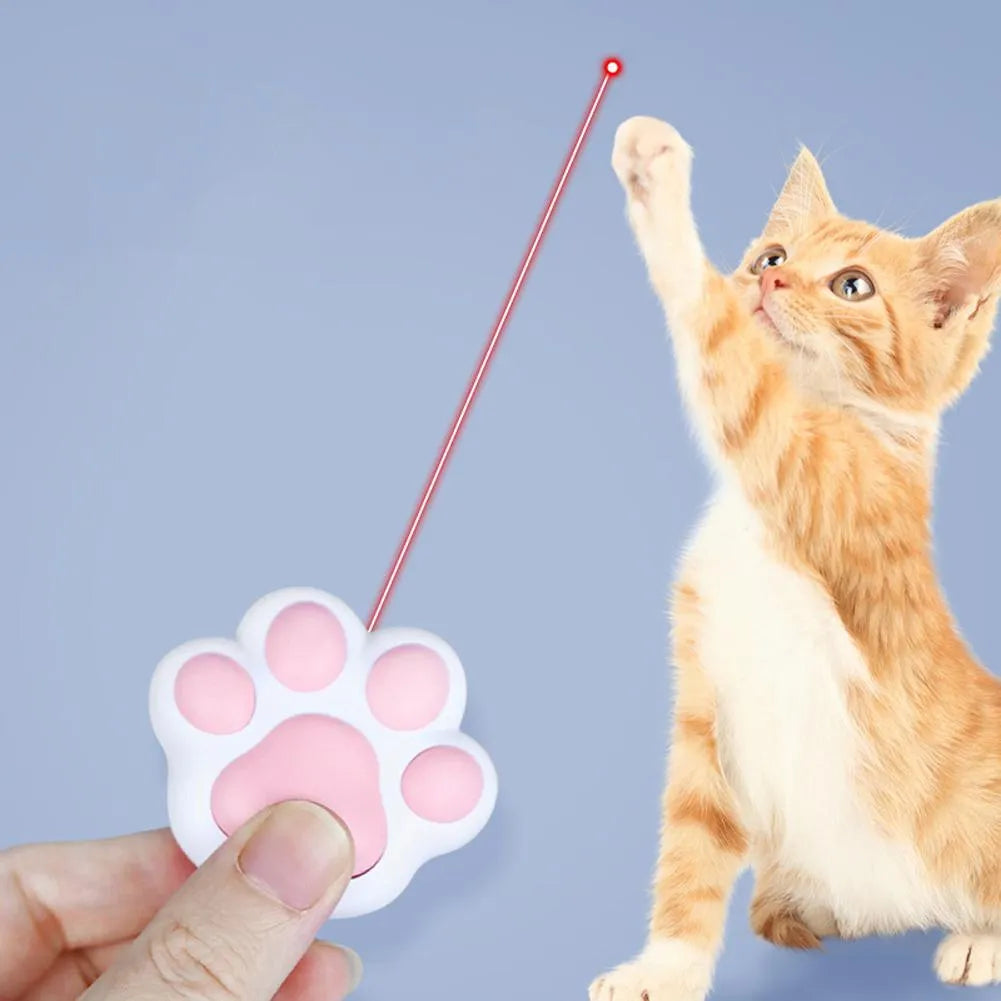 Pink and black rechargeable infrared cat teaser toy with keychain attachment showing 5cm dimensions