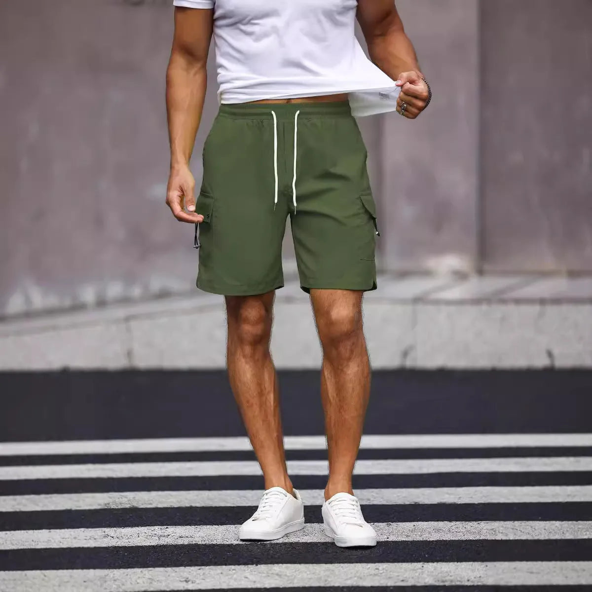 Men's loose fit workwear shorts in fluorescent green and army green colours with straight leg design