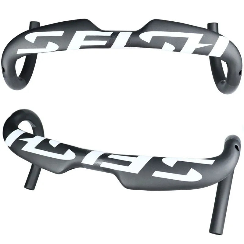 Carbon fibre road bike bent handlebar showing 31.8mm clamp area and drop profile