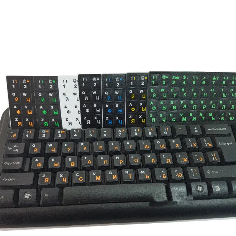 Russian layout keyboard film, black PVC with orange Cyrillic letters, 14-inch universal size