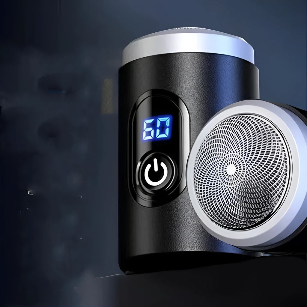 Black mini rechargeable electric shaver with USB cable and cleaning brush on a white background