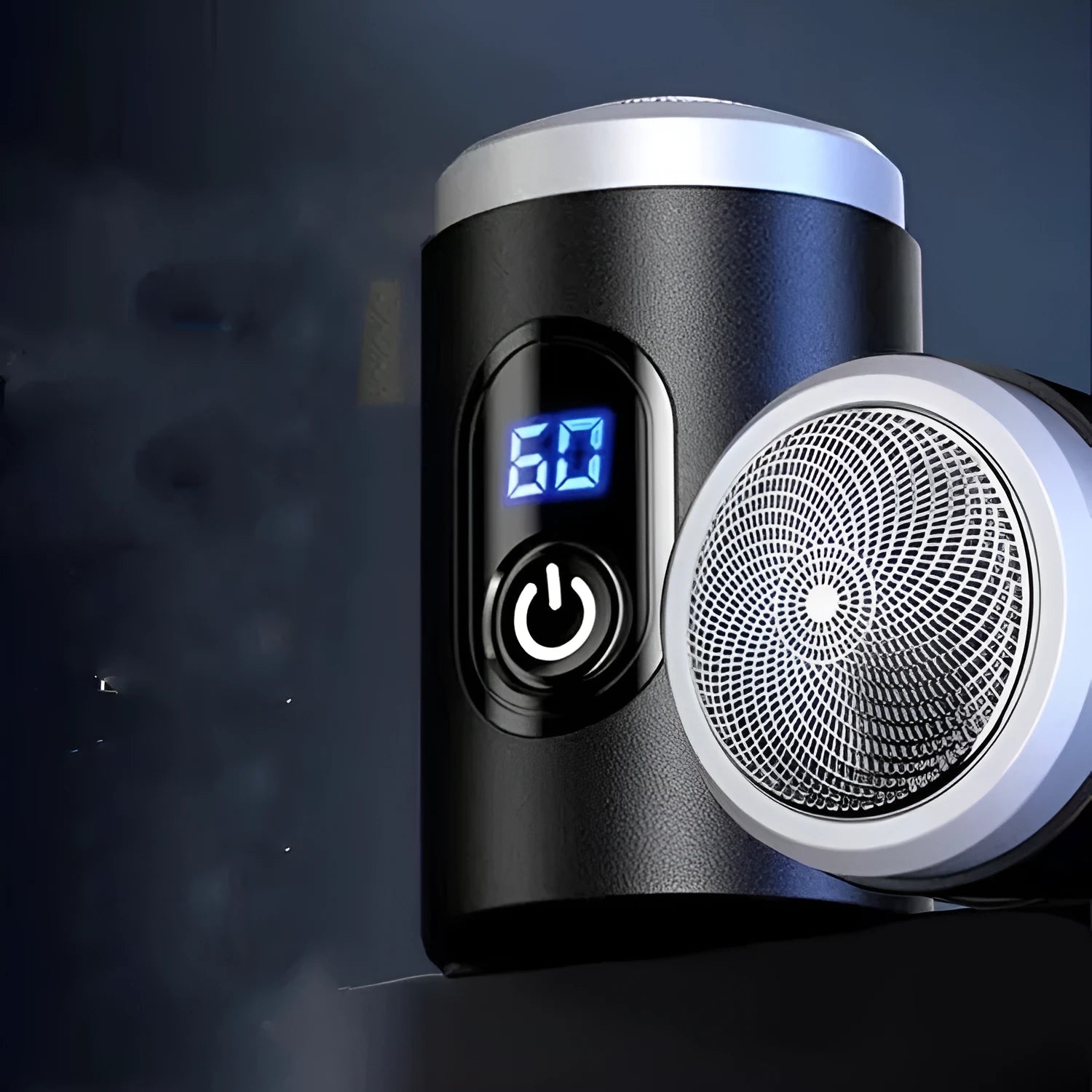 Black mini rechargeable electric shaver with USB cable and cleaning brush on a white background