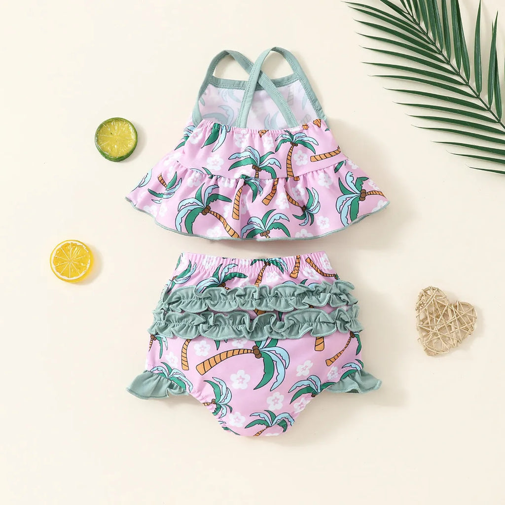 White children's two-piece polyester swimsuit set with top and shorts on a hanger.