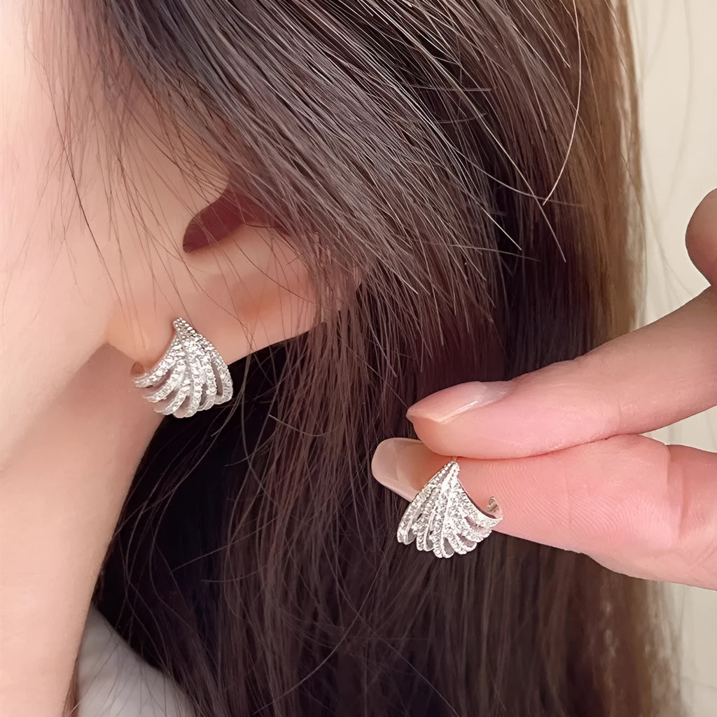 Geometric zircon earrings with platinum electroplated finish and clean line design
