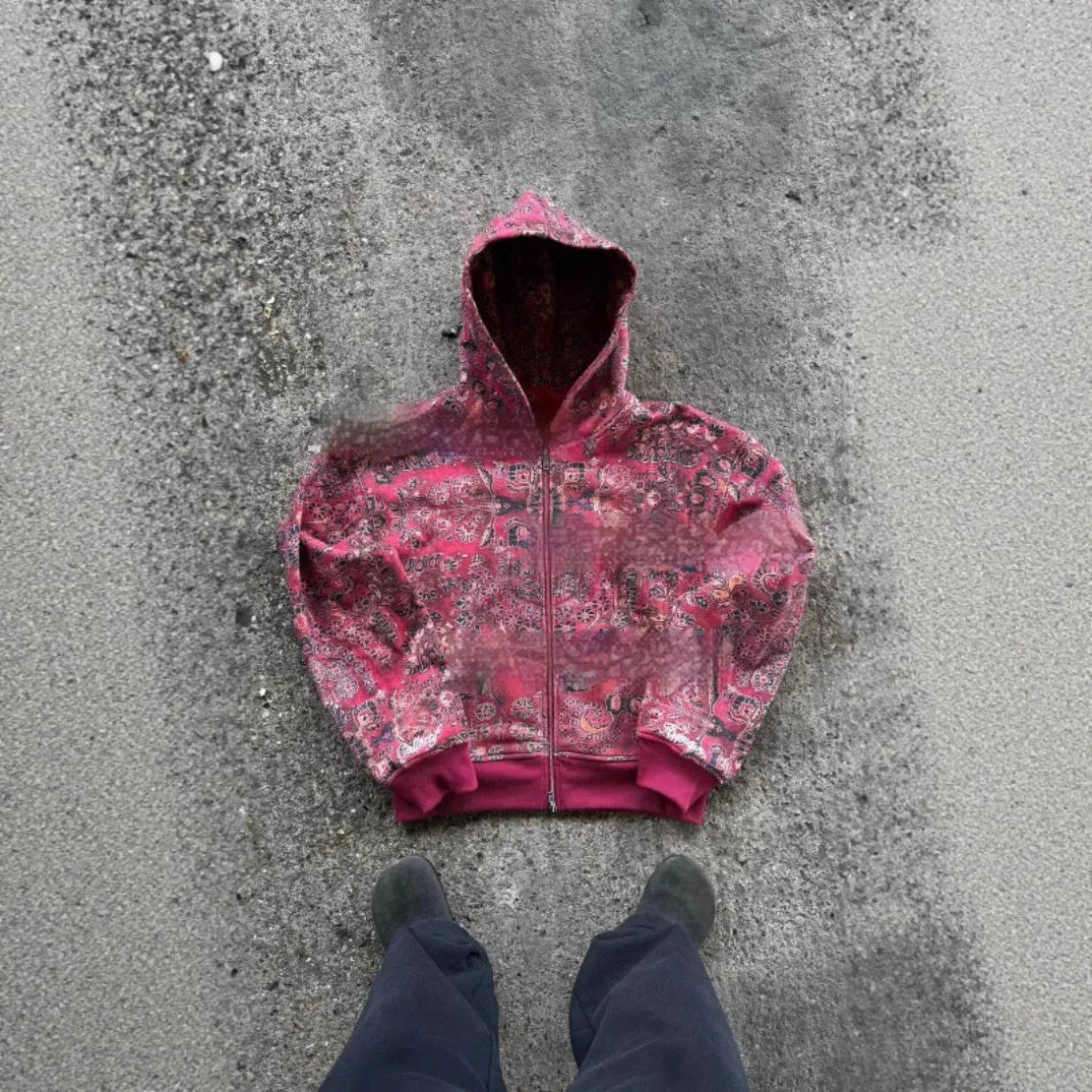 A man's loose-fitting red hooded zip-up coat with long sleeves, shown on a size chart.