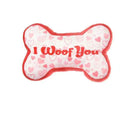 Dog plush tooth cleaning toy in bone powder colour with bite-resistant construction