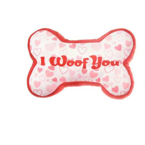 Dog plush tooth cleaning toy in bone powder colour with bite-resistant construction
