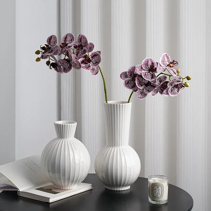 White American country style ball striped ceramic vase with orchid arrangement