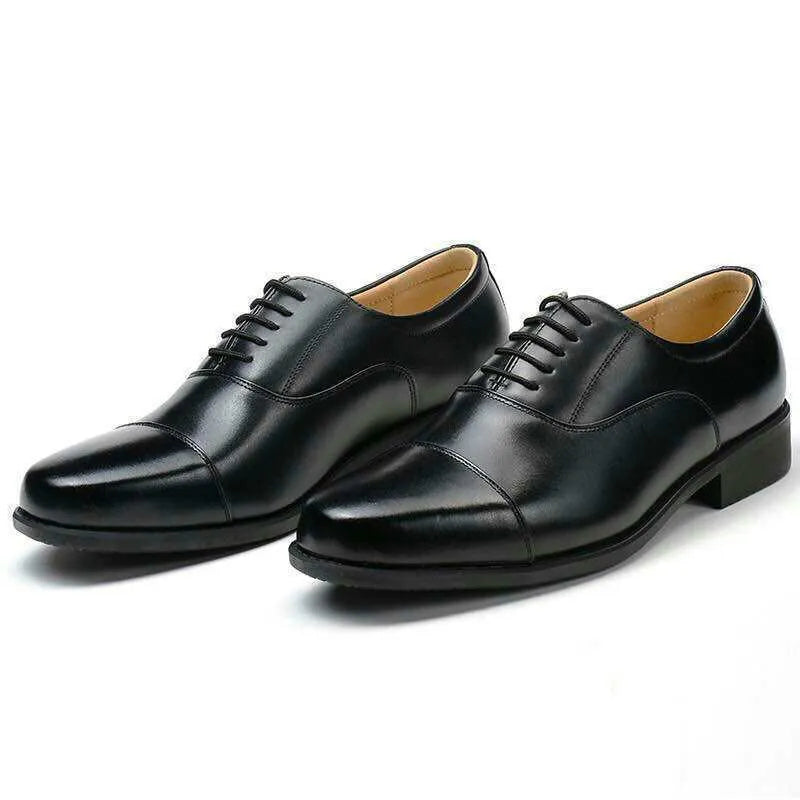 Mesh three connector business casual leather shoes with round toe, rubber sole, and PU upper in lace-up style on display