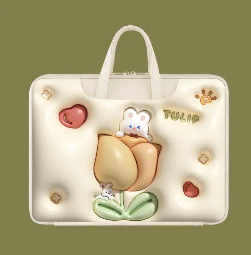 Inflatable PU leather laptop bag in a character design, shown hanging from a suitcase handle.