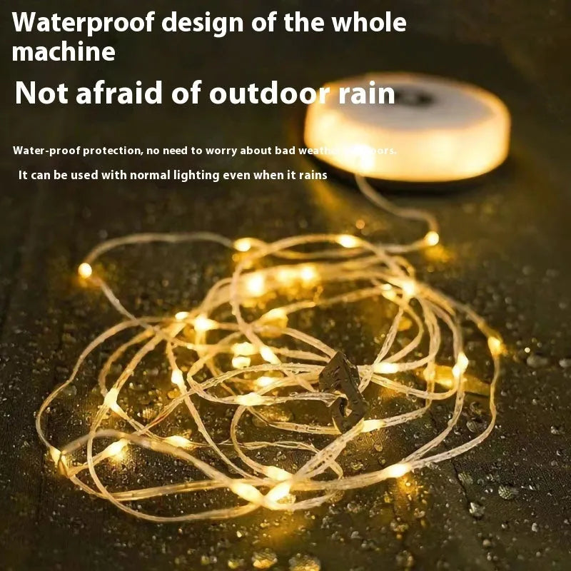 Rechargeable outdoor string lights with LED beads draped over a garden tent.