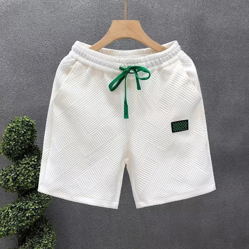 Men's casual sports shorts in solid colours with micro-elastic polyester fabric