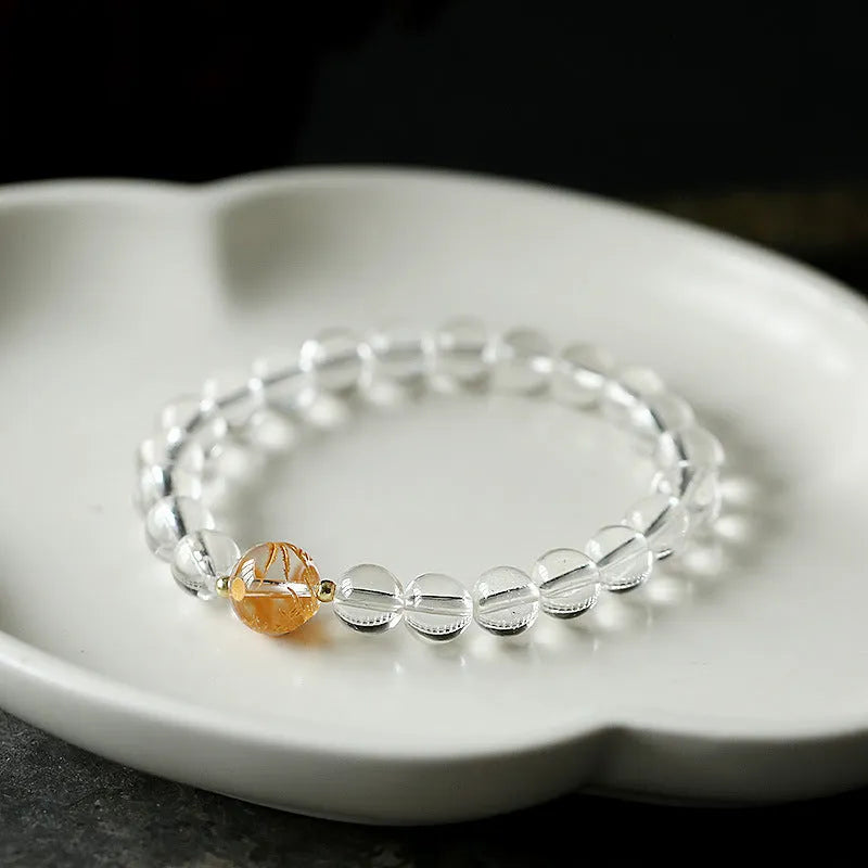 Geometric obsidian and white crystal bracelet with black agate beads and golden dragon centrepiece for 14-16cm wrists