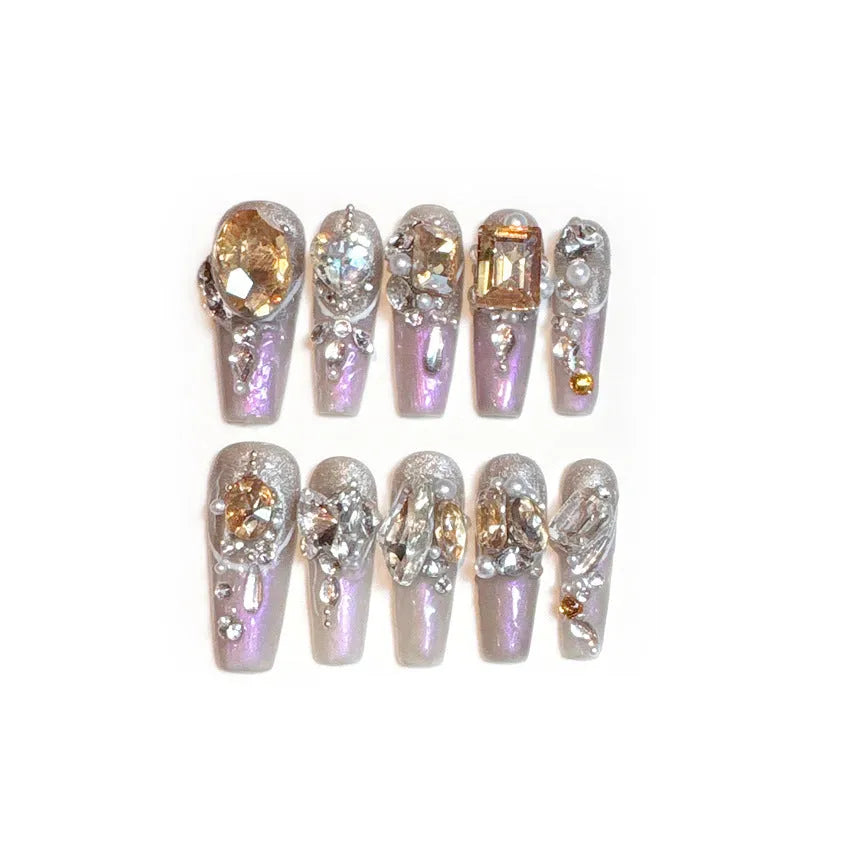 False nail patches in card packaging with adhesive or tool application options for ladies