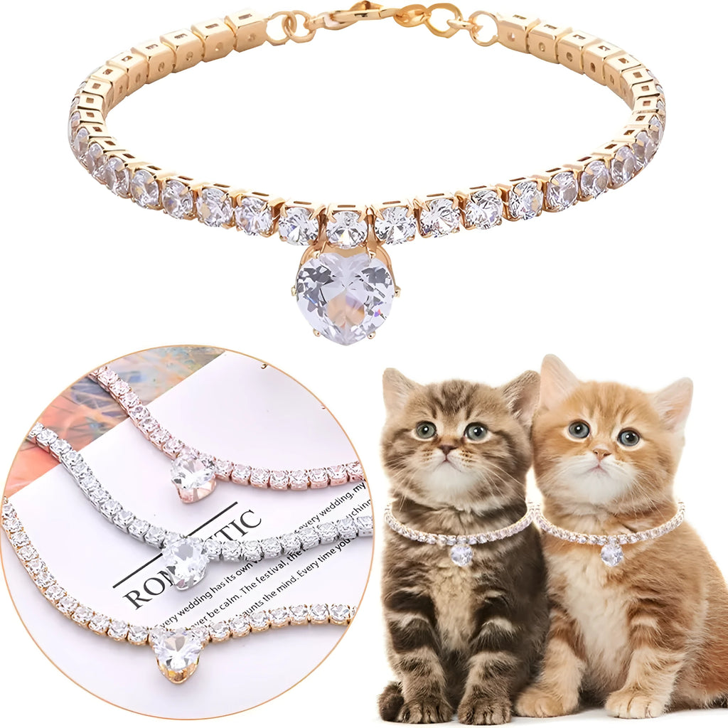 Gold rhinestone heart-shaped decorative collar for a dog with an extension chain.