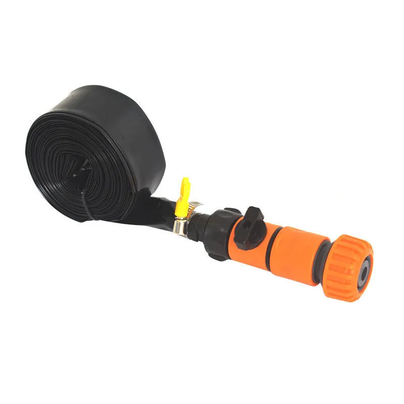 Portable blue garden sprinkler with solar panel and PVC switch on grass