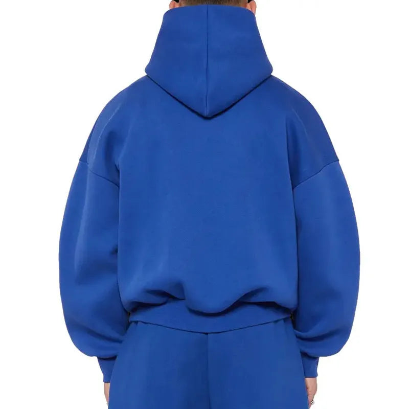 Men's grey fleece-lined pullover hoodie with wool lining shown in casual wear