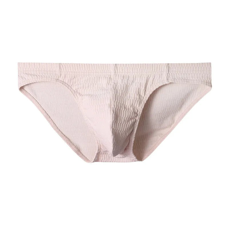 Men's solid colour cotton triangle underwear briefs on a mid-waist, shown in a skin tone colour.