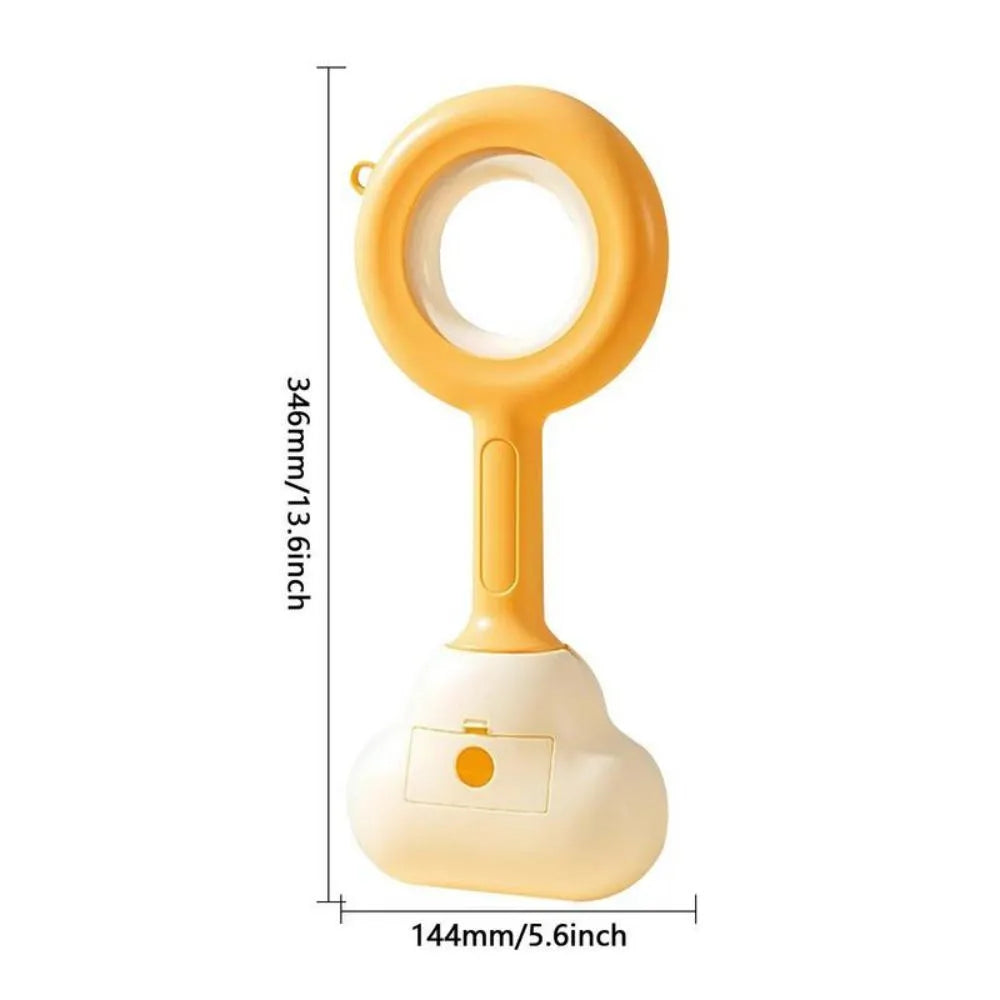 Blue cloud shape jaw dog pooper scooper on a lawn