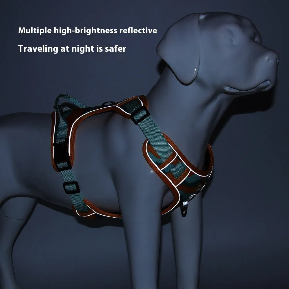 Orange reflective dog chest and back harness with hand-holding rope on a neutral background.