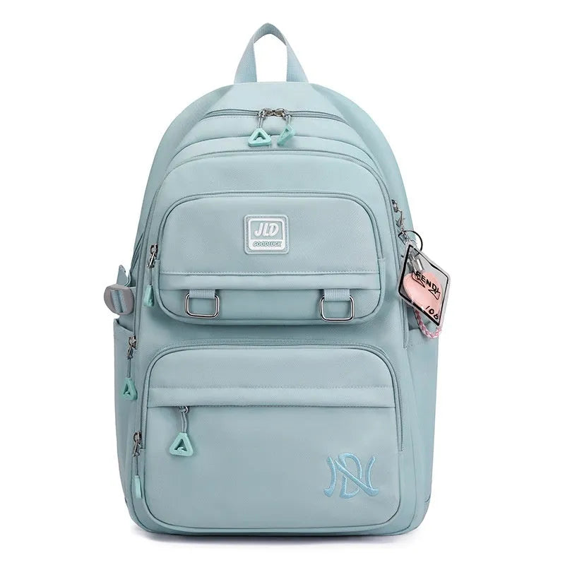 Large capacity nylon school backpack for girls in a choice of colours and patterns, showing ergonomic backplate.