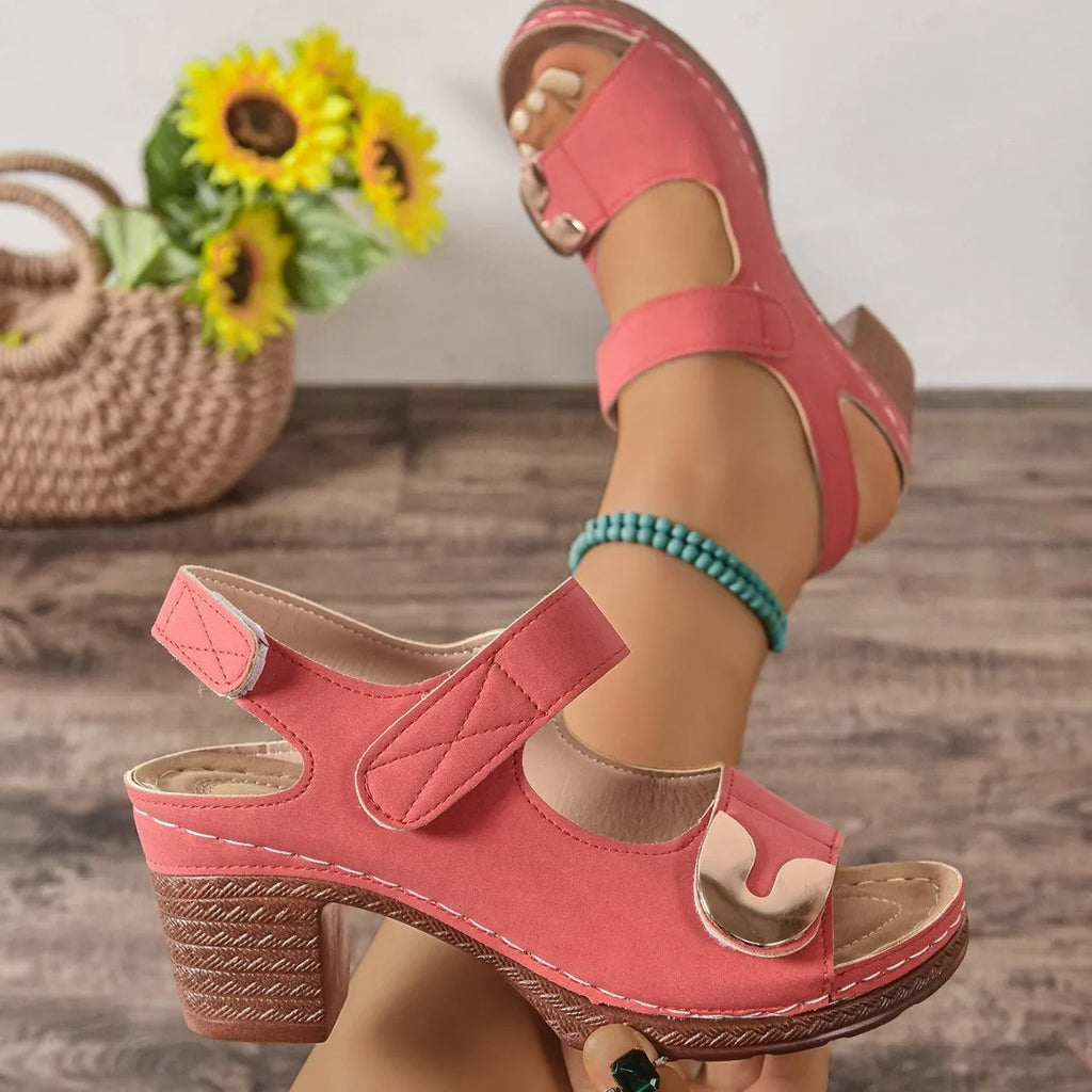 Light brown Velcro Roman sandals with an adjustable strap and rubber sole