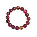Women's watermelon-coloured crystal bracelet with pastoral design, shown in different size options.